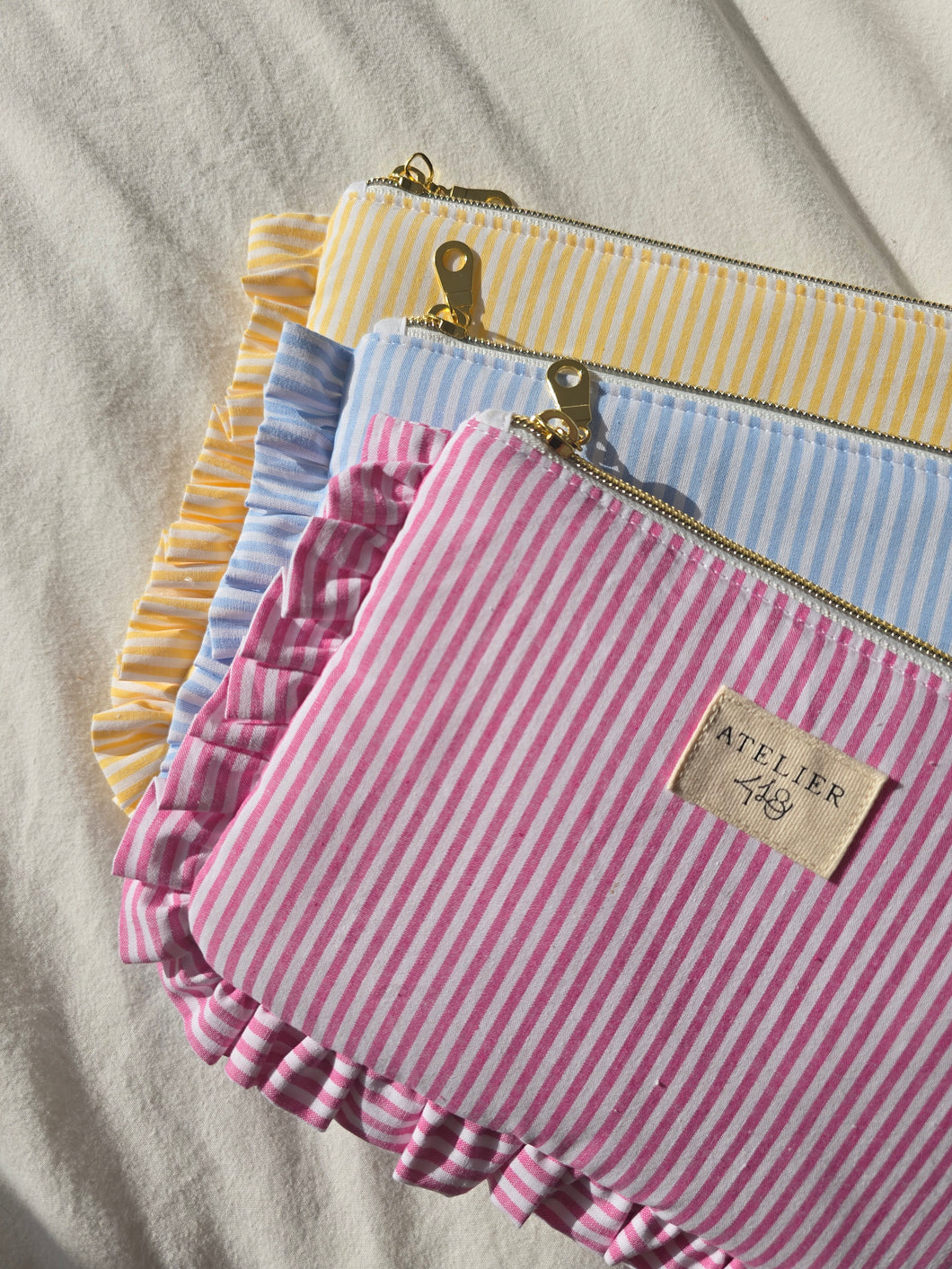 📦 Pochette plate à froufrous rayé